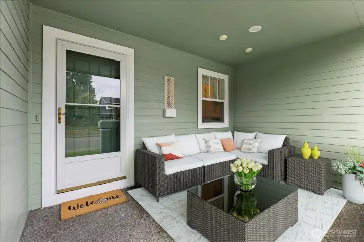 The large front porch welcomes you in. Virtually staged.
