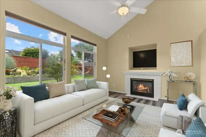 Family room with gas fireplace. Natural Gas furnace, dryer & Hot water heater too. Virtually staged.