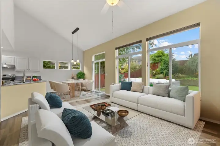Light & bright with vaulted ceilings, skylights & tall windows. Virtually staged.