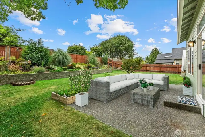Patio area & backyard. Virtually staged.