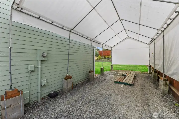 30 Ft. RV parking w/ carport & 30-amp power.