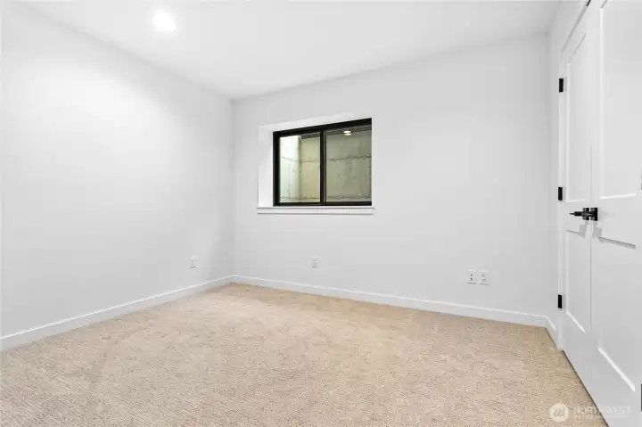 One of two downstairs bedrooms.