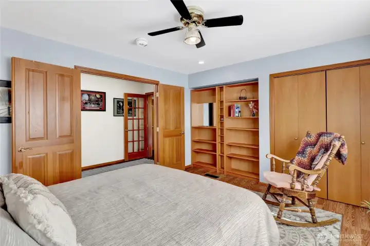 It includes a large closet & built in display shelves.