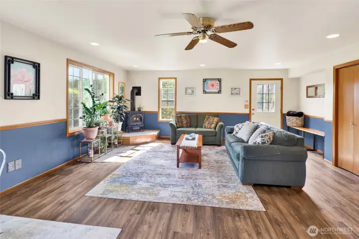 From the cozy free standing gas fireplace, to the exterior entrance, this is the perfect vision for multi-generational living!