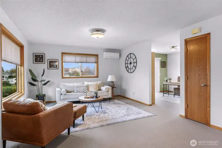 Open Living Room with newer AC unit