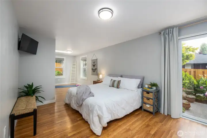 Extremely spacious primary suite has TWO walk-in closets, a sitting area that can be used as your work from home space, or for a sitting area or exercise room.  Slider leads to the back yard and patio.