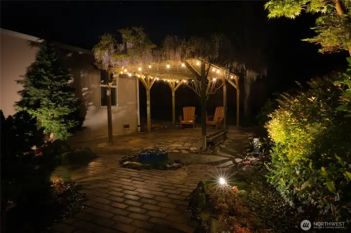 Thoughtfully placed outdoor lighting helps create a peaceful and inviting ambiance after the sun sets.