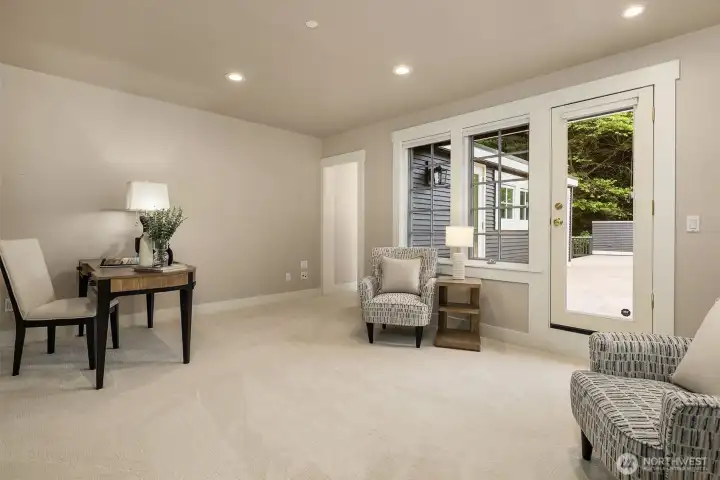 Versatile and beautifully finished, this bonus room offers quiet separation from the main living areas with its own private entry to the deck.