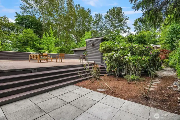 Nestled in the thoughtfully landscaped grounds, this hot tub-ready corner is a quiet retreat within the retreat.
