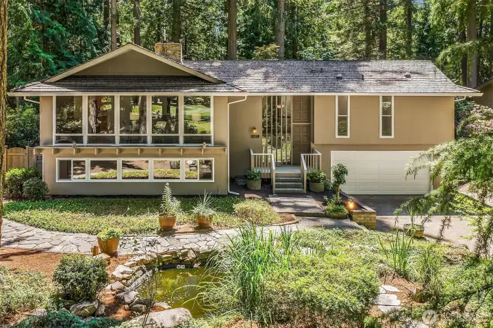 Welcome home to this beautifully updated golf course rambler.