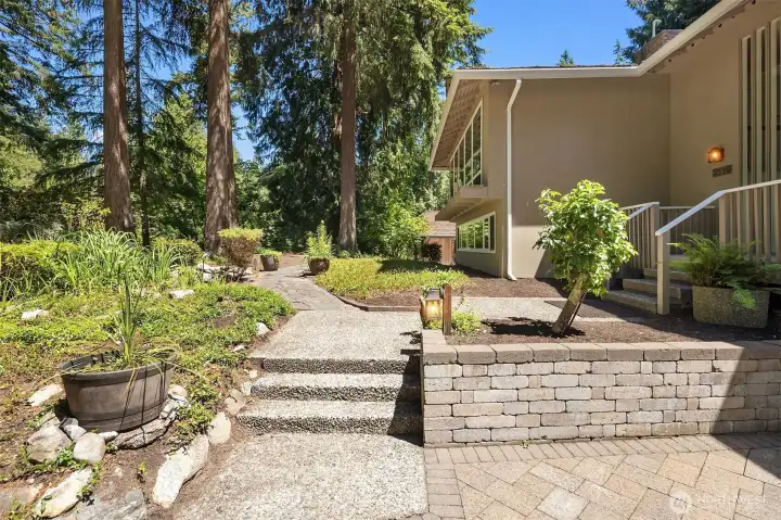 Established landscaping provides year-round beauty.