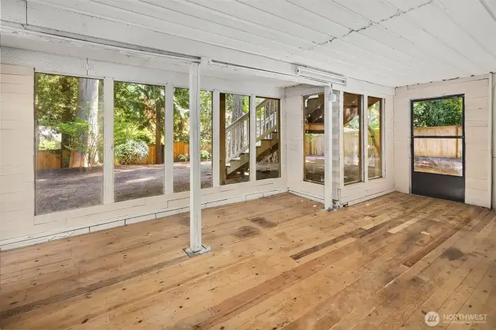 Walls of windows invite the outdoors in.