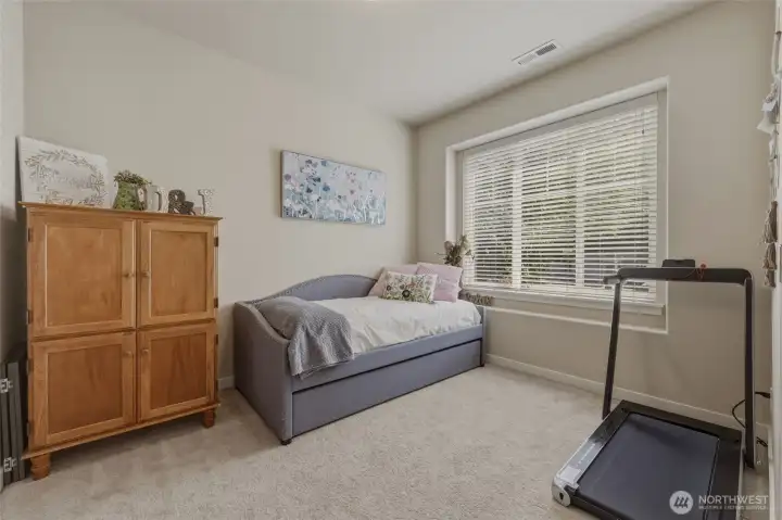 Just off the foyer is this office/den with double doors and picture window-- work from home?  school room?  hobby space?  guest room?  You decide!