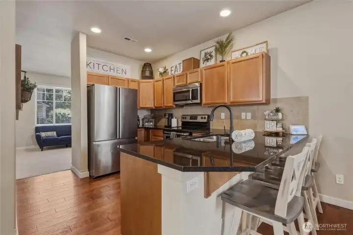 French door fridge, built-in micro, newer dishwasher and bar counter make daily time spent here a pleasure.