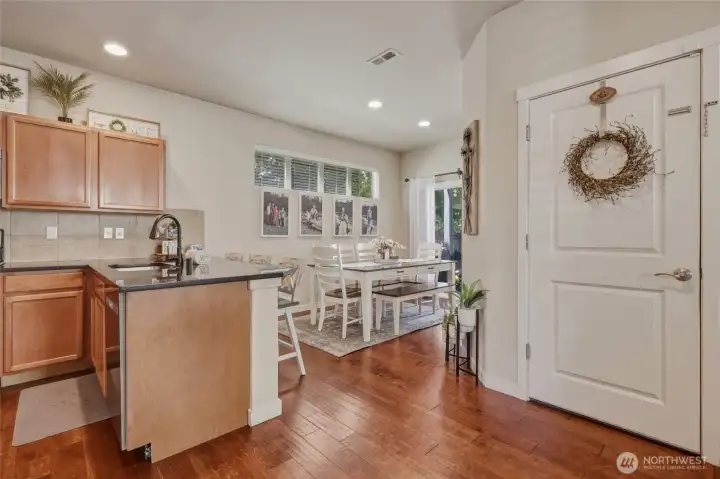 The heart of this inviting home--where life takes place! Garage door entry seen here. Family room behind photo...
