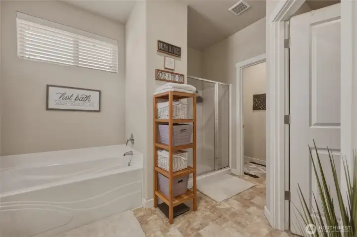 Large soaking tub is sure to delight when you need to unwind...