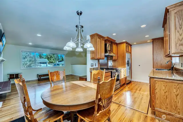 View facing west on the upper level of dining, kitchen and living rooms.