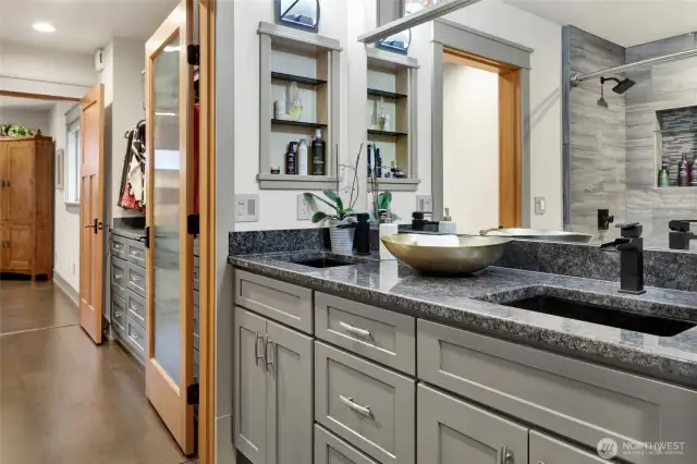 View of the walk-through closet from the bathroom