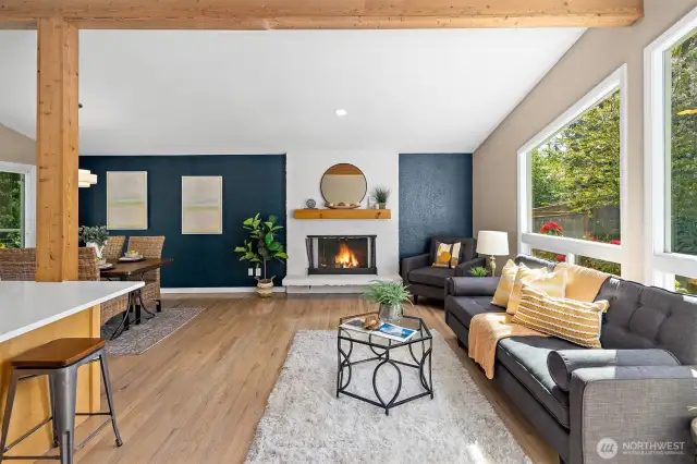 Gleaming hardwood floors, beamed ceilings, and high-end finishes throughout.