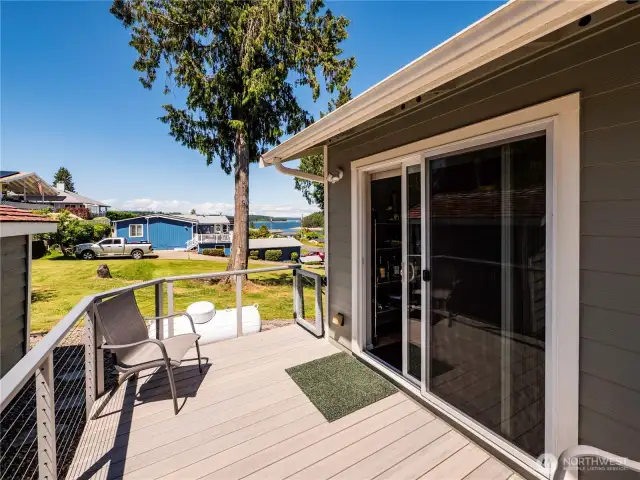 DECK OFF THE KITCHEN...OUTBUILDING AND GARAGE TO THE LEFT...FENCED IN TO KEEP PETS WHERE YOU WANT EM!