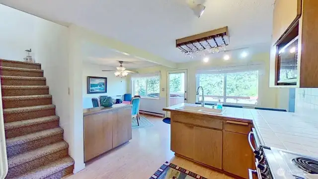Kitchen and dining area take full advantage of the view windows.