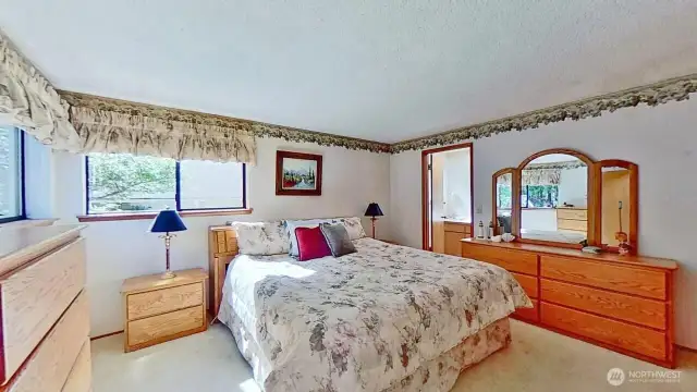Primary bedroom on the main level with ensuite bathroom