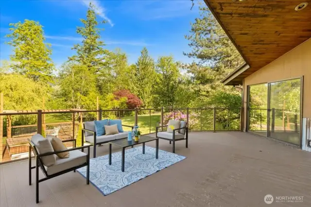 Spacious deck perfect for entertaining, unwinding, and taking in the peaceful natural surroundings.
