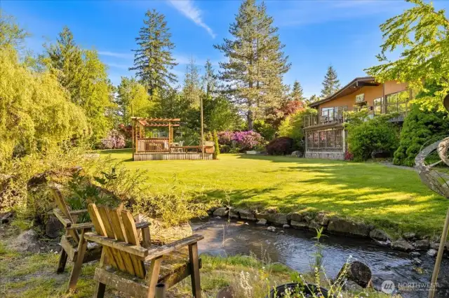 Stunning and lush landscape surround you at this Twin Creeks Estate.