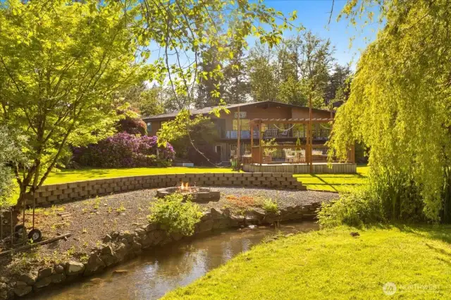 Twin creeks with charming footbridges—watch seasonal salmon migrations from your own backyard.