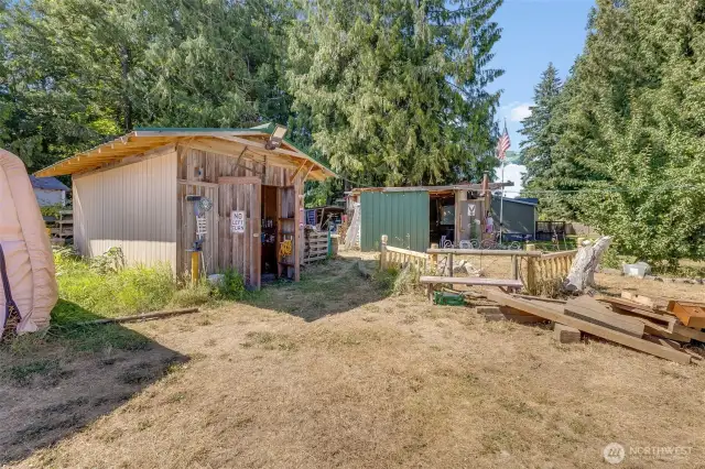 View of workshop, bar, and firepit