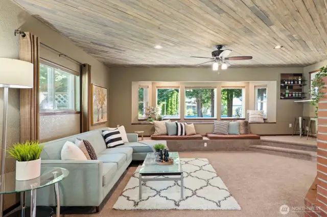 The huge bay window offers a chill space with a wall-to-wall bench seating perfect to snuggle up with a good book or just watch the world go by.