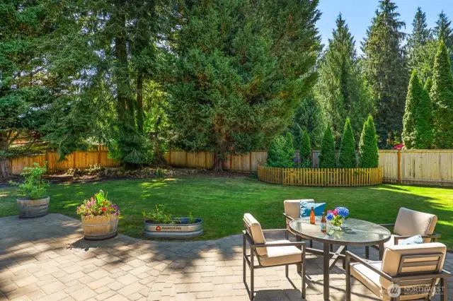 In every direction, this home's grounds have been thoughtfully manicured for easy maintenance, beauty, and privacy.
