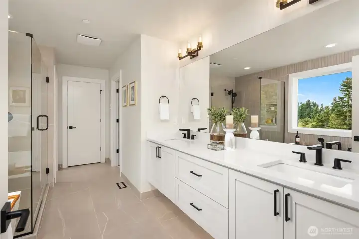 Primary bath with heated floor and motion sensor under cabinet lighting