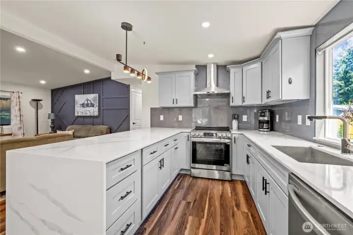 Space In kitchen to prepare food, to serve guests, and entertain.