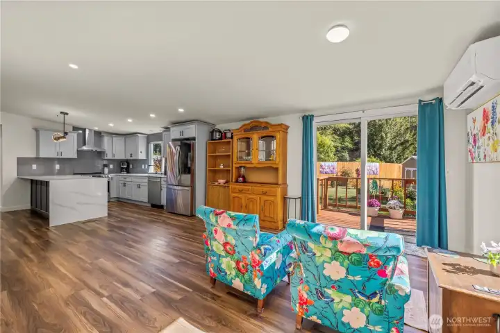 Dining Room with Vaulted Ceilings, has AC Unit to stay cool, dine your guest and have them look out at nature.