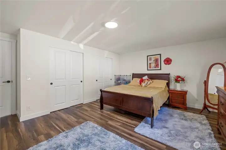 View of closets, and where your primary bed will be. With LED lighting above.