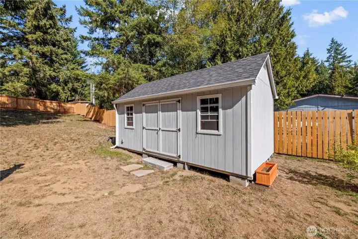 First shed upon entrance, has power and can be used for hobbies year around inside. Brand new 2025.
