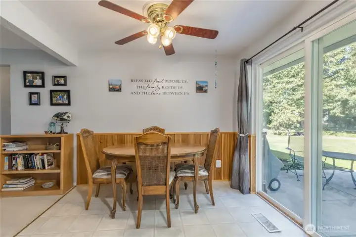 Dining room with slider to back patio