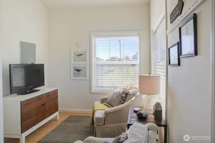 Enter the home into this charming & cozy little den and just down the hall....