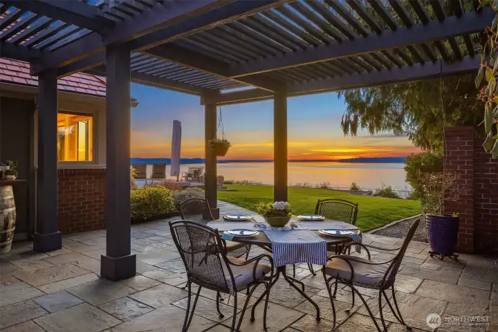 Enjoy dining al fresco under the arbor while taking in the stunning sunsets.