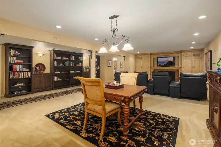 This lower level rec room offers plenty of space for game nights, movie nights and gatherings for watching the big games.