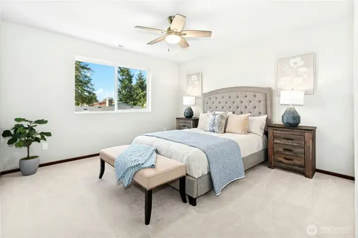 Bedroom #3 with ceiling fan and large closet.