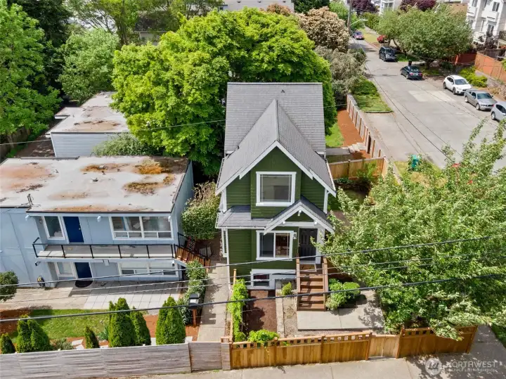 Let your green thumb thrive and make this fully fenced-in yard your own outdoor oasis! This space offers endless possibilities for gardening, relaxation, and creating a beautiful, personalized outdoor area. Complete with a patio for dining, room for a fire pit for cozy evenings, or a vegetable garden to enjoy fresh, homegrown produce. All this and the fence is new!