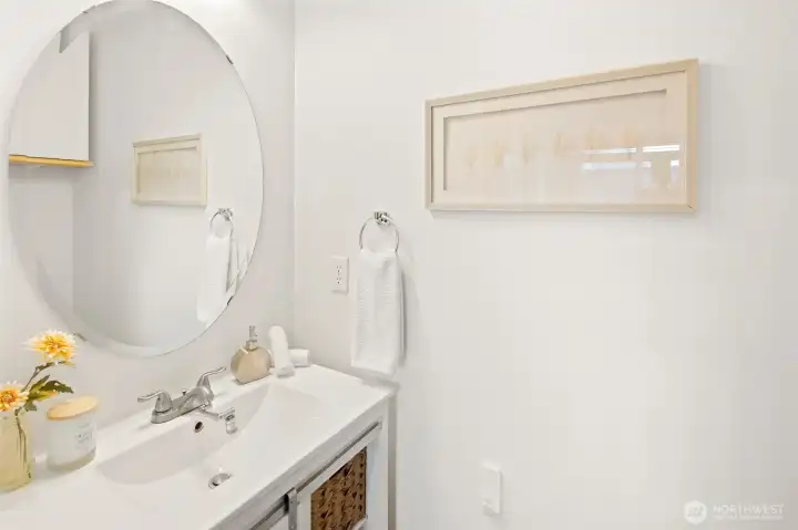Half bath on main floor is convenient for visiting guests.
