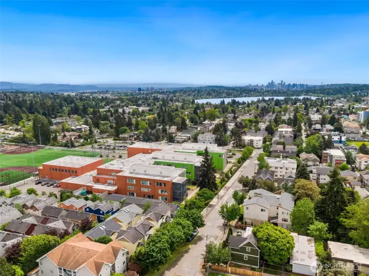 Welcome to your new home! Nestled on a desirable corner lot, this charming Craftsman-style residence boasts a fresh, inviting look with new paint adorning both the interior and exterior walls.