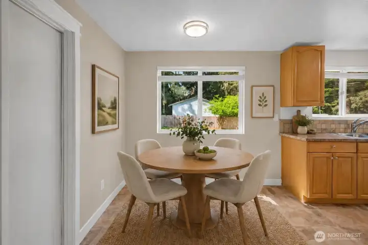 Virtually staged dinning room.