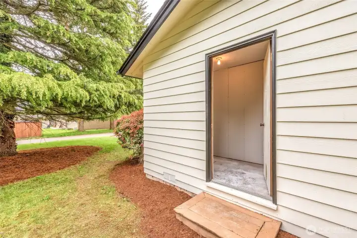 Extra storage room on side of home that could be fully finished and used as additional closet space or room to one of the bedrooms.