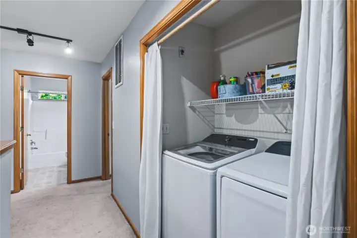 Laundry Conveniently Located Between Bedrooms