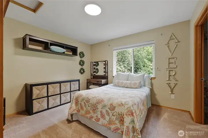 Generous in scale, the third upstairs bedroom offers a cozy yet airy retreat. The large closet and ample wall space allow for flexible furniture arrangements, while the abundance of natural light enhances the room's warm and welcoming atmosphere. Generous in scale, the third upstairs bedroom offers a cozy yet airy retreat. The large closet and ample wall space allow for flexible furniture arrangements, while the abundance of natural light enhances the room's warm and welcoming atmosphere.