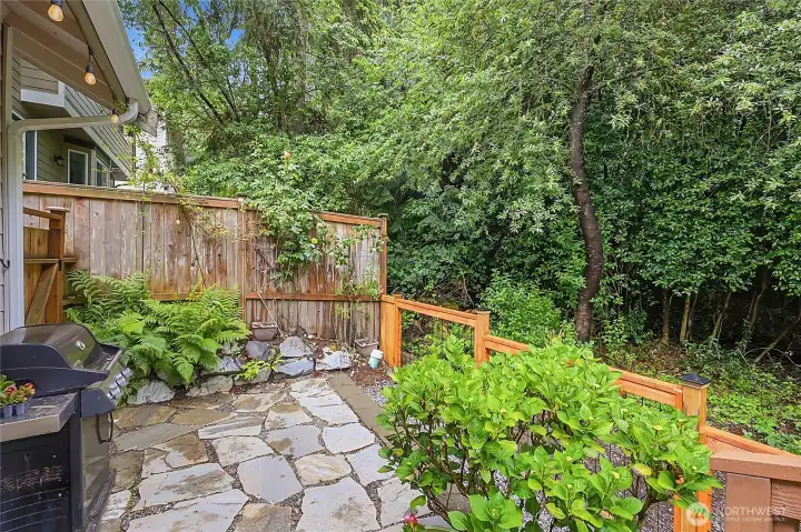 This property is a rare find, bordered by a protected natural growth area that provides an evergreen wall of privacy. Low-maintenance landscaping. Ideal for both quiet relaxation and large-scale summer gatherings. This property is a rare find, bordered by a protected natural growth area that provides an evergreen wall of privacy. Low-maintenance landscaping. Ideal for both quiet relaxation and large-scale summer gatherings.